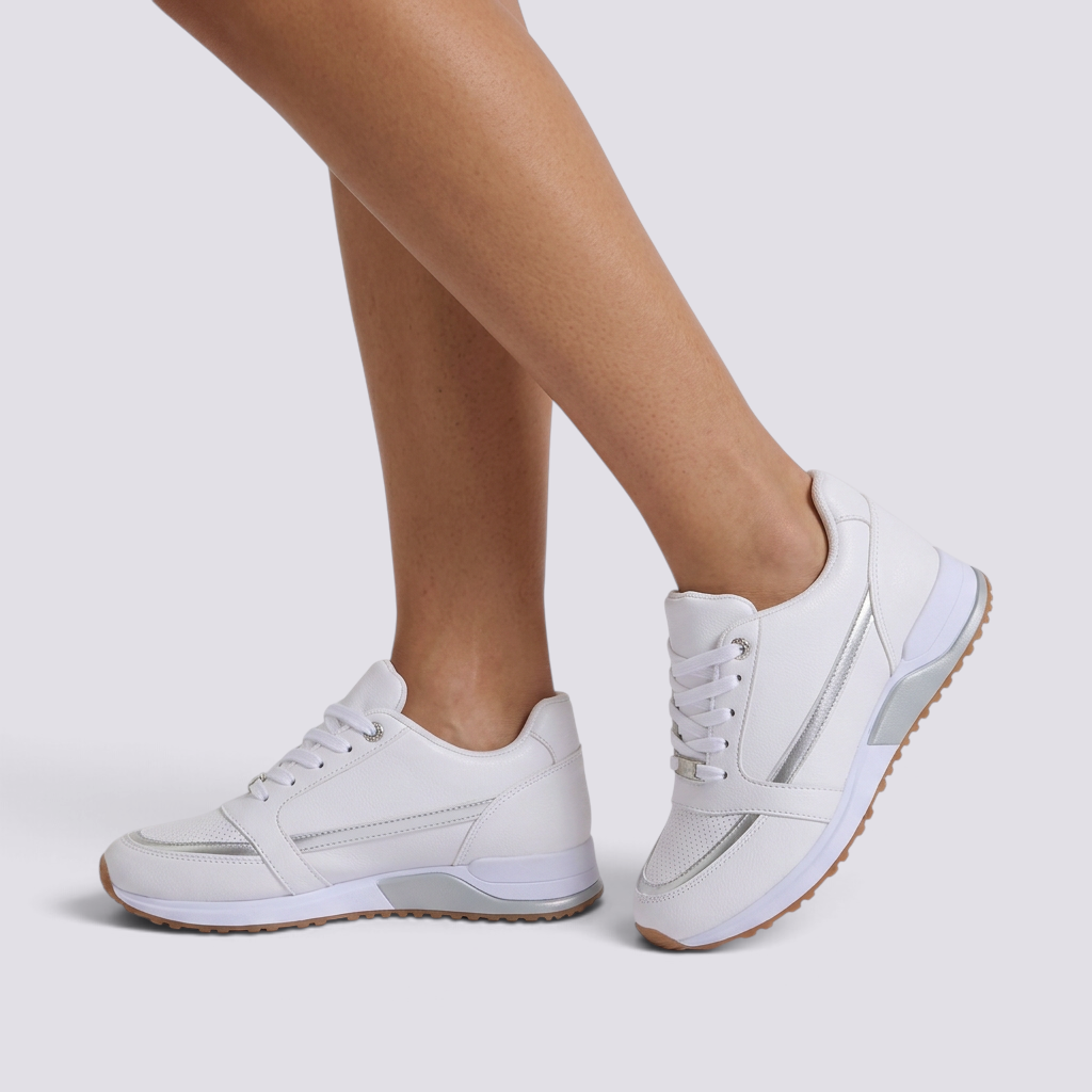 Zapatillas deportivas mujer con detalle metalizado blanco vista lateral