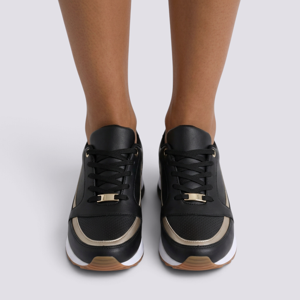 Zapatillas deportivas mujer con detalle metalizado negro vista frontal